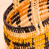 Bolsas_Indigenas_010_49cb4895-2acb-45d2-95cf-a0cfc2043828_bolsas+tramas-e-cores–indigena-comprar-banner-site-tucum