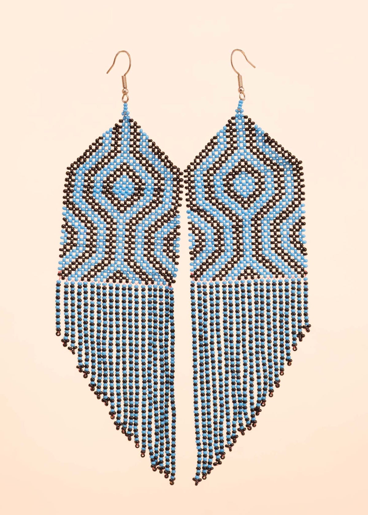 Brincos Kayapó - Joia Indígena | Tucum Brasil