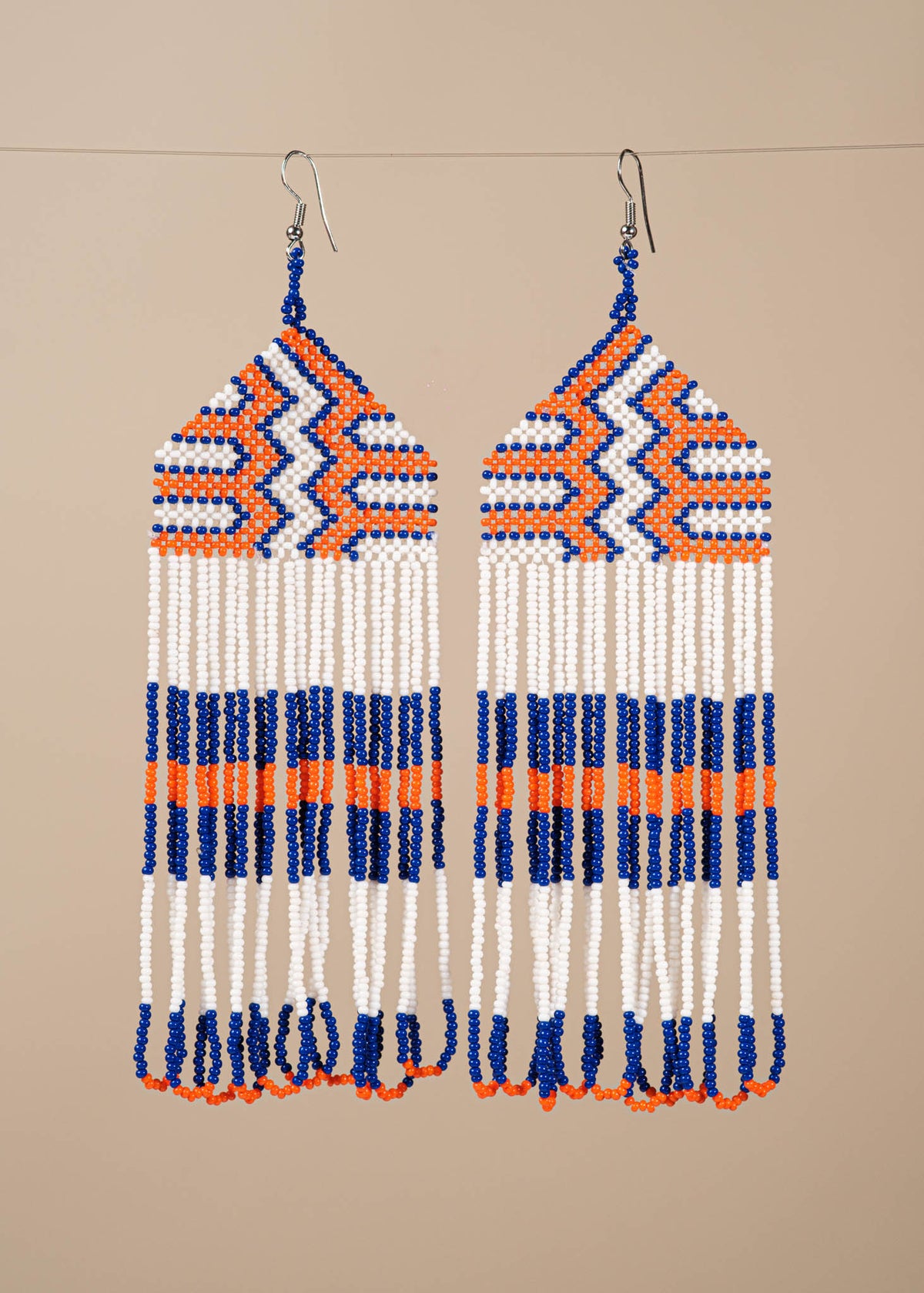 Kit brincos Kayapó + creme Cumaru e Copaíba | TUCUM