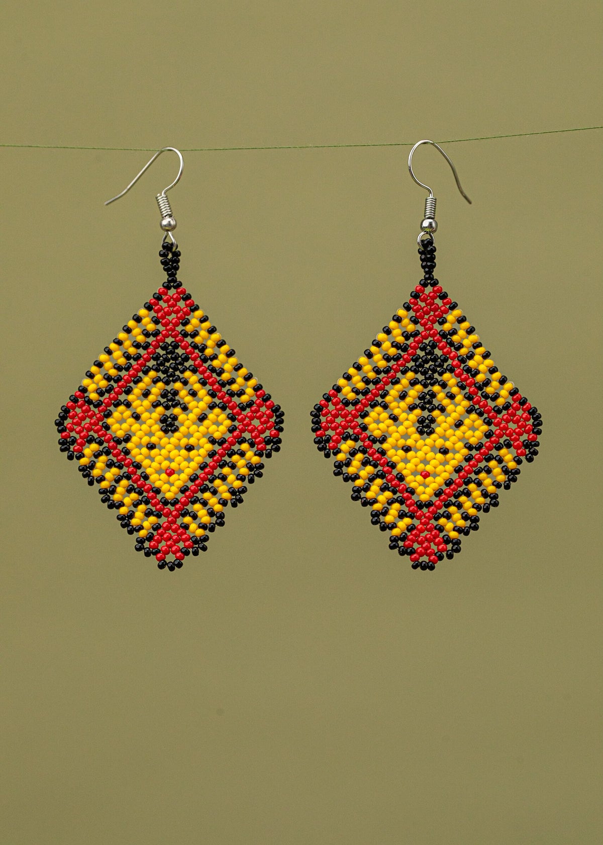 Brincos Gavião - Joia Indígena | Tucum Brasil