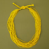 Colares_Indigenas_041_60c085a5-aebb-45d0-ab3e-8ba4f633d7bf_colares-kamayura-indigena-comprar-banner-site-tucum