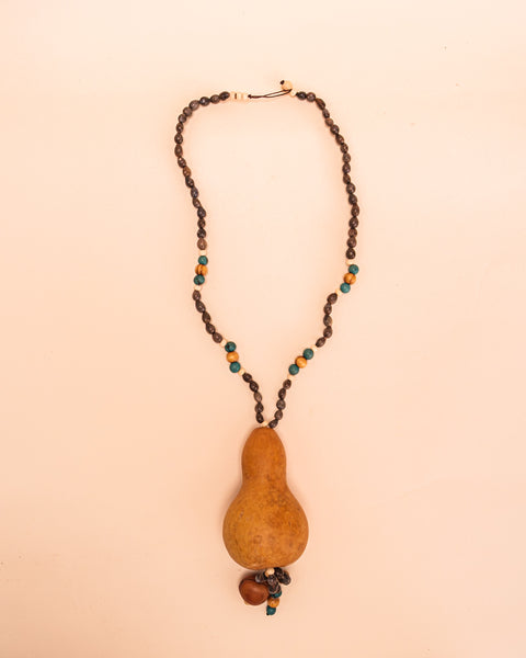 Colares_Indigenas_179_84b6ad83-96e5-4fc7-b5fb-99ca73a5992f_brincos-TWINS- indigena-comprar-banner-site-tucum