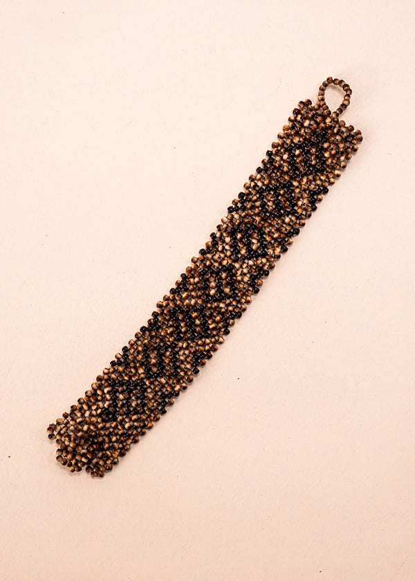 Pulseiras_Indigenas_068_4978abcb-8e13-40a3-84a6-1cfb9cc69f79_pulseira-kraho+indigena-comprar-banner-site-tucum