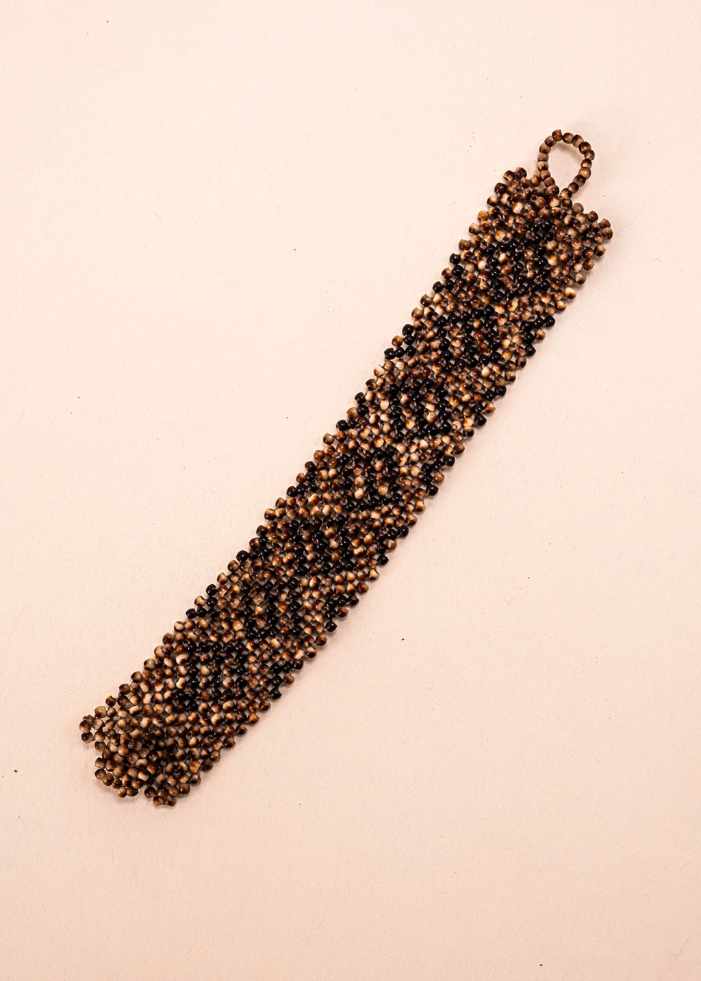 Pulseiras_Indigenas_068_4978abcb-8e13-40a3-84a6-1cfb9cc69f79_pulseira-kraho+indigena-comprar-banner-site-tucum