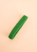 Pulseira de miçangas verde feita pelo povo Waurá, artesanato indígena brasileiro