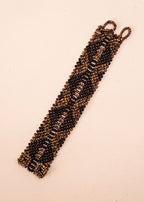 Pulseiras_Indigenas_080_2e33182d-d6b3-4d4b-919b-e07d59513caf_pulseira-kraho+indigena-comprar-banner-site-tucum