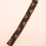 Pulseiras_Indigenas_092_18a08be4-c224-4217-8709-00bba89ab551_pulseira-kraho+indigena-comprar-banner-site-tucum