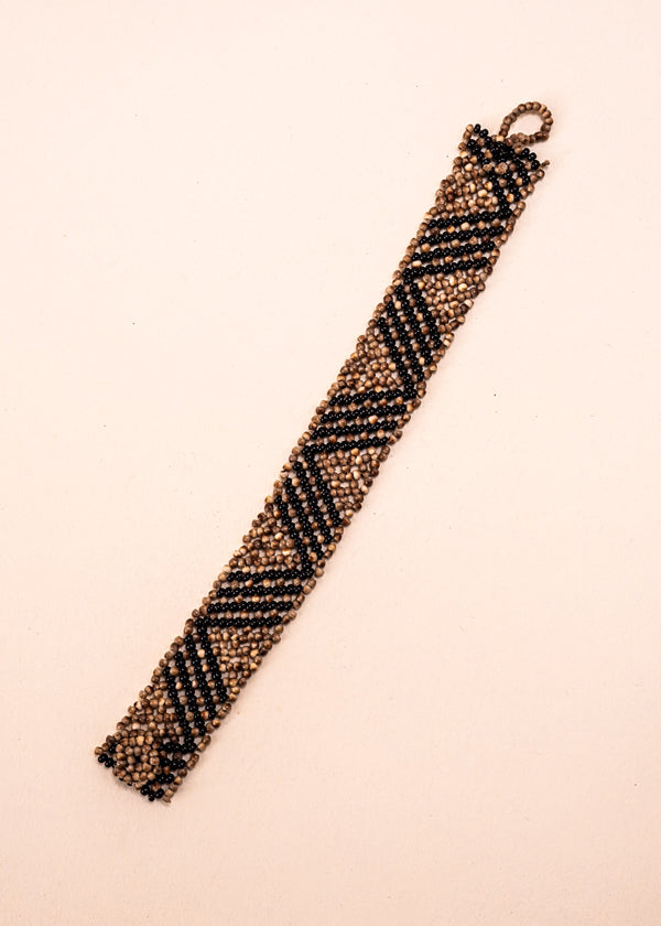 Pulseiras_Indigenas_092_18a08be4-c224-4217-8709-00bba89ab551_pulseira-kraho+indigena-comprar-banner-site-tucum