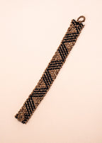 Pulseiras_Indigenas_092_18a08be4-c224-4217-8709-00bba89ab551_pulseira-kraho+indigena-comprar-banner-site-tucum