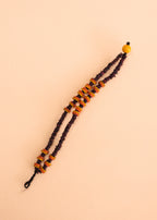 Pulseira de látex e sementes colorida, feita pelo povo Jamaraquá, artesanato indígena brasileiro 