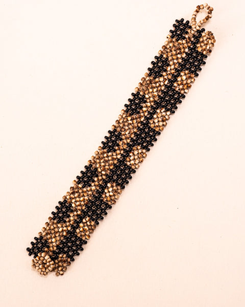 Pulseiras_Indigenas_178_1_a73d007a-f6e3-46b9-9547-4e8e9d9bd91c_pulseira-kraho+indigena-comprar-banner-site-tucum