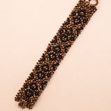 Pulseiras_Indigenas_186_c366d424-e657-4b05-b742-eaa90be0bd47_pulseira-kraho+indigena-comprar-banner-site-tucum