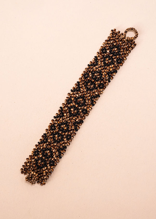 Pulseiras_Indigenas_186_c366d424-e657-4b05-b742-eaa90be0bd47_pulseira-kraho+indigena-comprar-banner-site-tucum