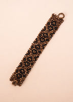 Pulseiras_Indigenas_186_c366d424-e657-4b05-b742-eaa90be0bd47_pulseira-kraho+indigena-comprar-banner-site-tucum