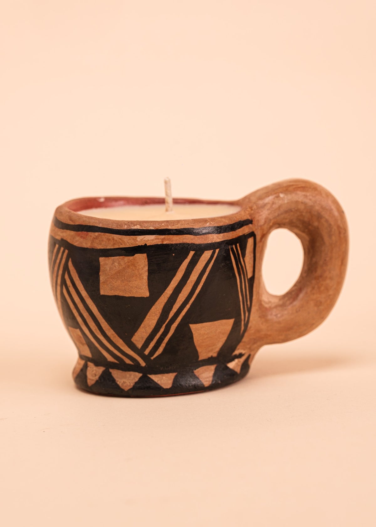 Kit máscara indígena Ticuna + Vela na cerâmica Waurá | Tucum Brasil