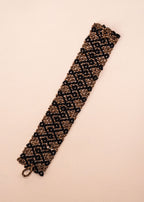 Pulseiras_Indigenas_033_800e01b5-a270-4063-ace0-f653984e709f_pulseira-kraho+indigena-comprar-banner-site-tucum